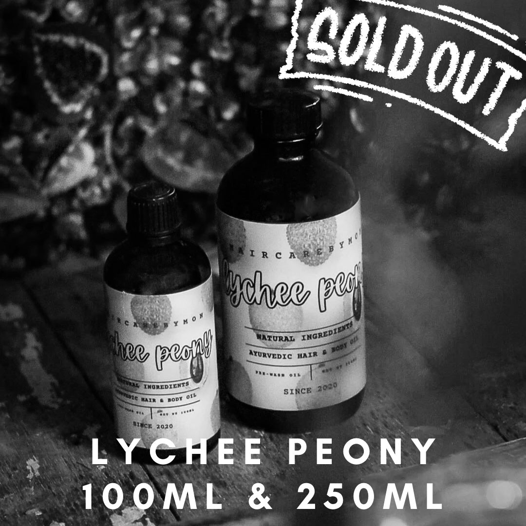 100ml (left) and 250ml (right) Lychee Peony Seasonal Scented Oil bottles 