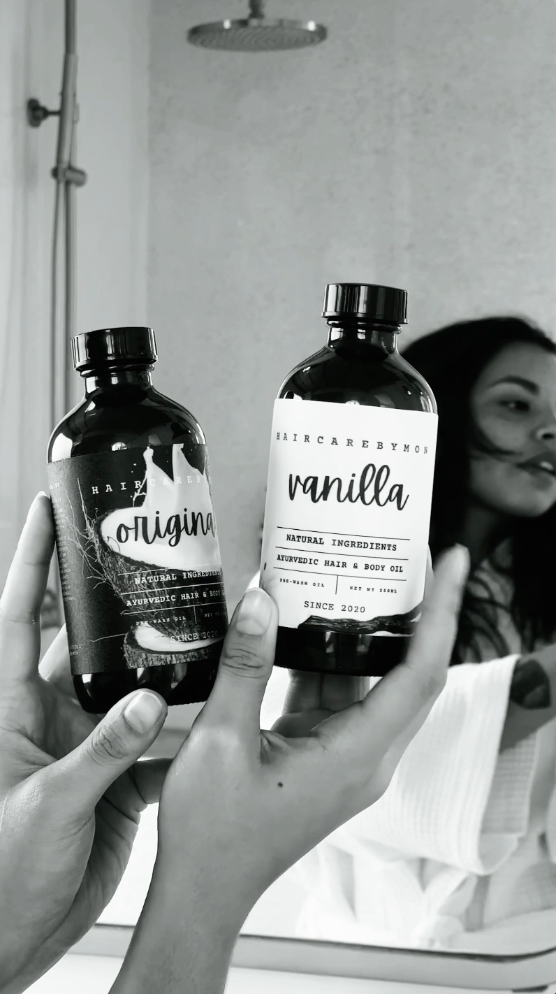 250ml Original (left) and Vanilla (right) oil bottles held By Jade Sophie